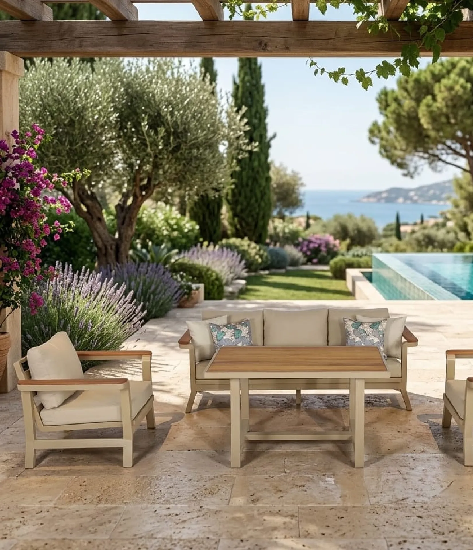 Valencia light-toned outdoor lounge set under a pergola